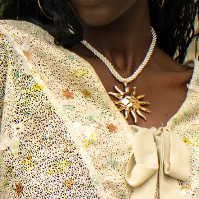 a gold pendant, from your closet