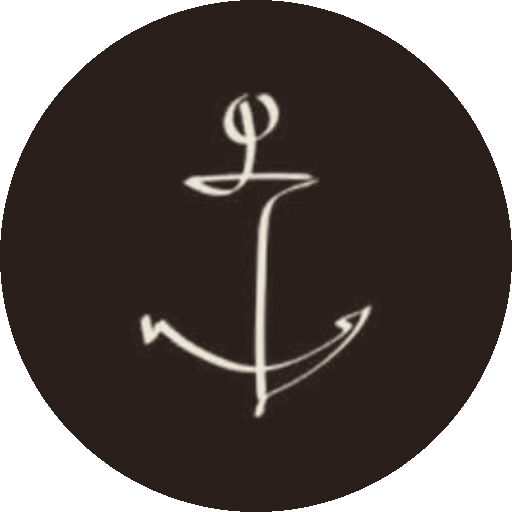 The Brass Sailor seal: the anchor reversed on an Ink disc