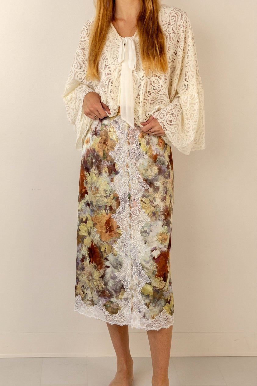 the blurred floral skirt